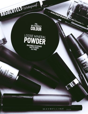 pexels-photo-2537930-2537930 Elegant monochrome flatlay showcasing a collection of beauty products and cosmetics.
